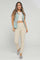 PANTALON SILUETA AJUSTADA CON PRENSES Y DETALLE