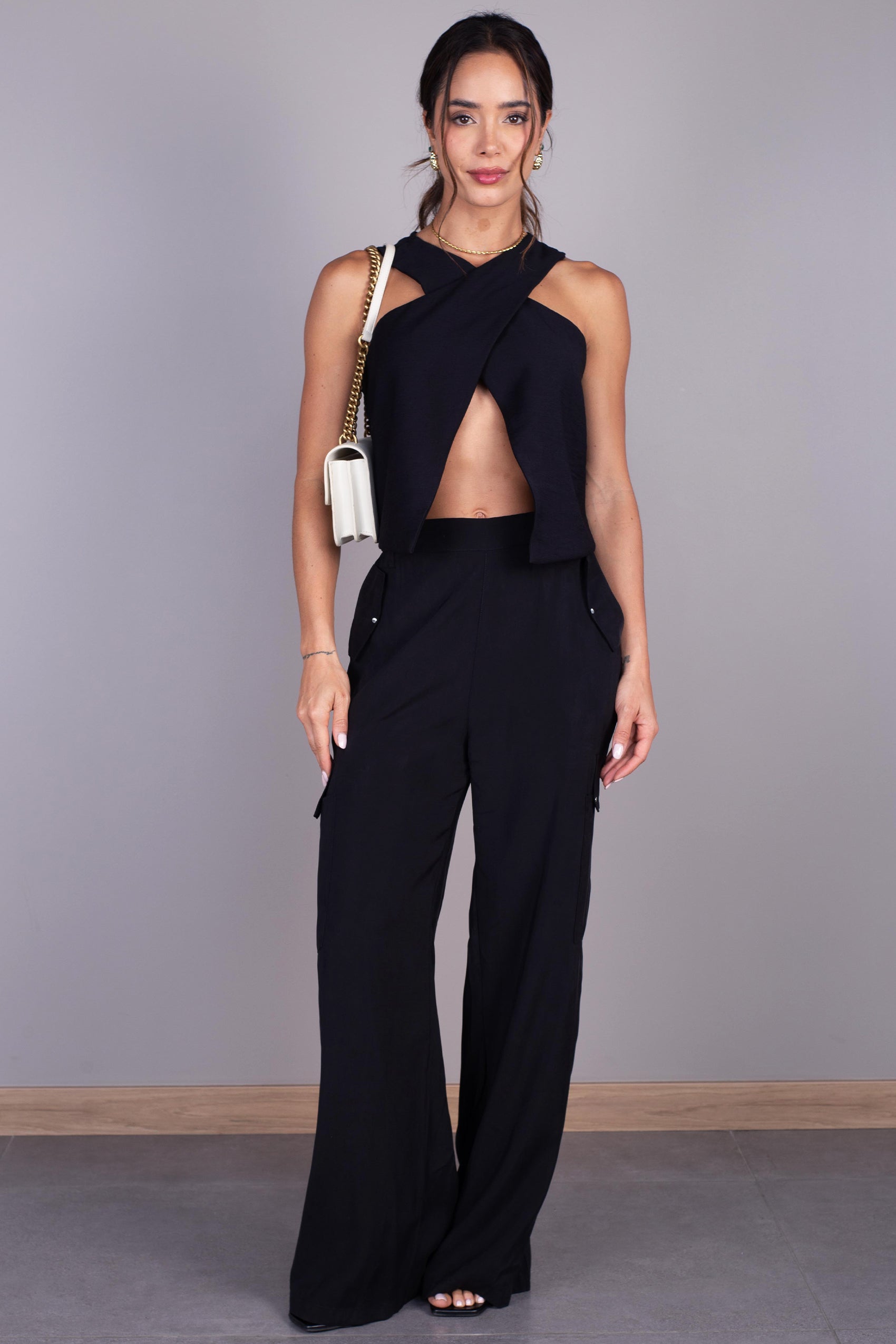 PANTALÓN SILUETA FLARE CON BOLSILLO