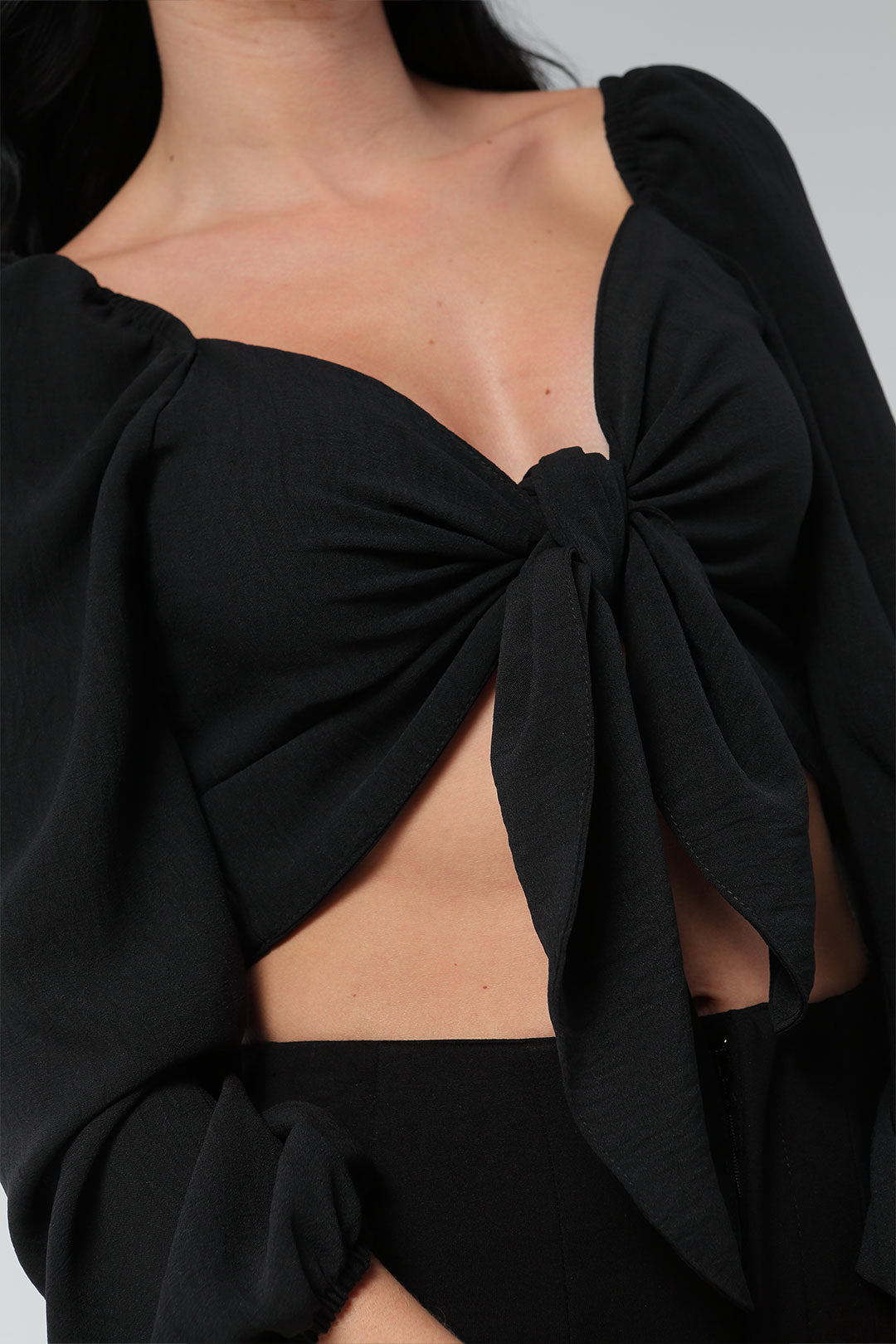 Blusa con nudo frontal, manga larga