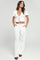PANTALON SILUETA FLARED CON PRETINA RECOGIDA
