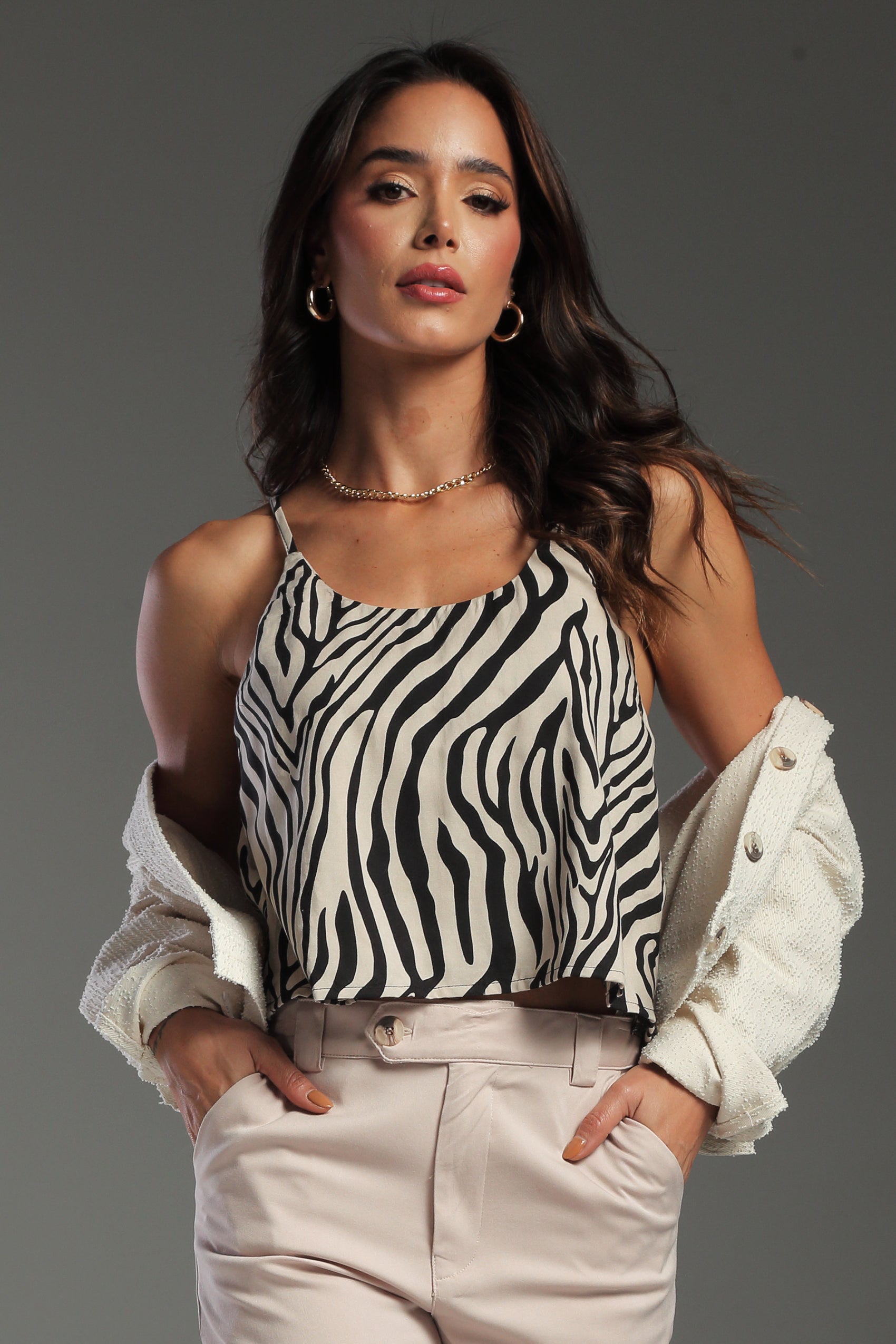 BLUSA SILUETA AMPLIA DE TIRAS AJUSTABLES