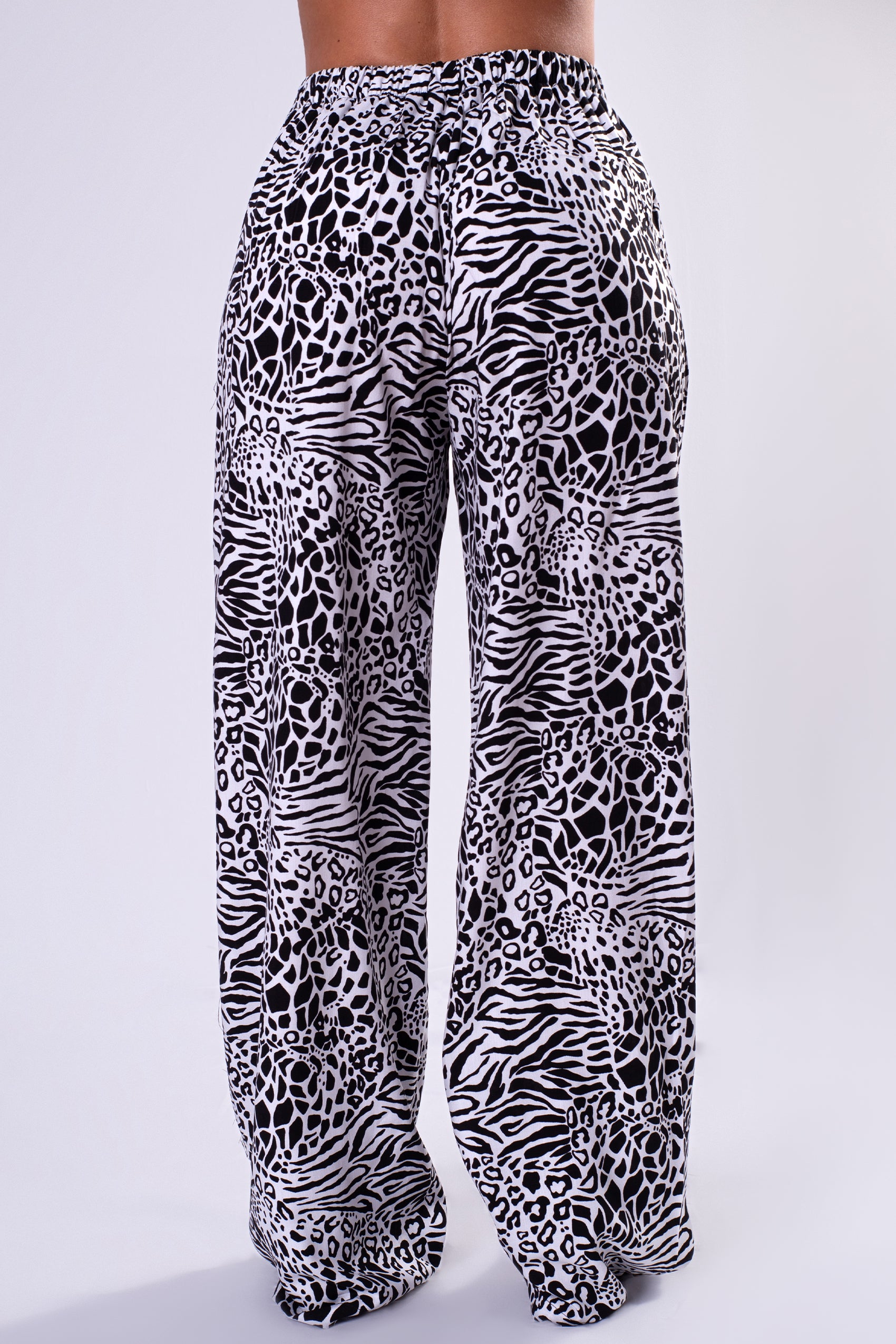 PANTALON ESTAMPADO SILUETA FLARED CON PRETINA RECOGIDA EN POSTERIOR Y CORDÓN