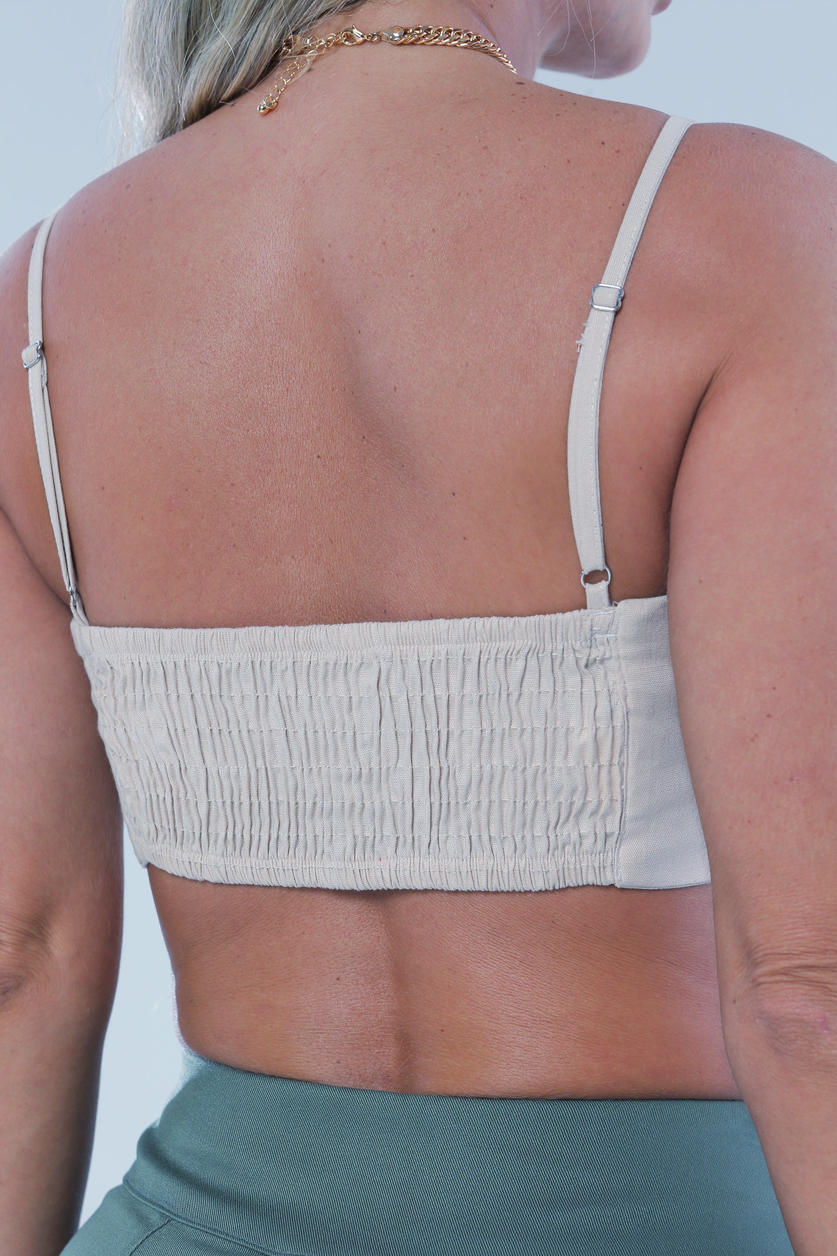 CROP TOP CON TIRA AJUSTABLE