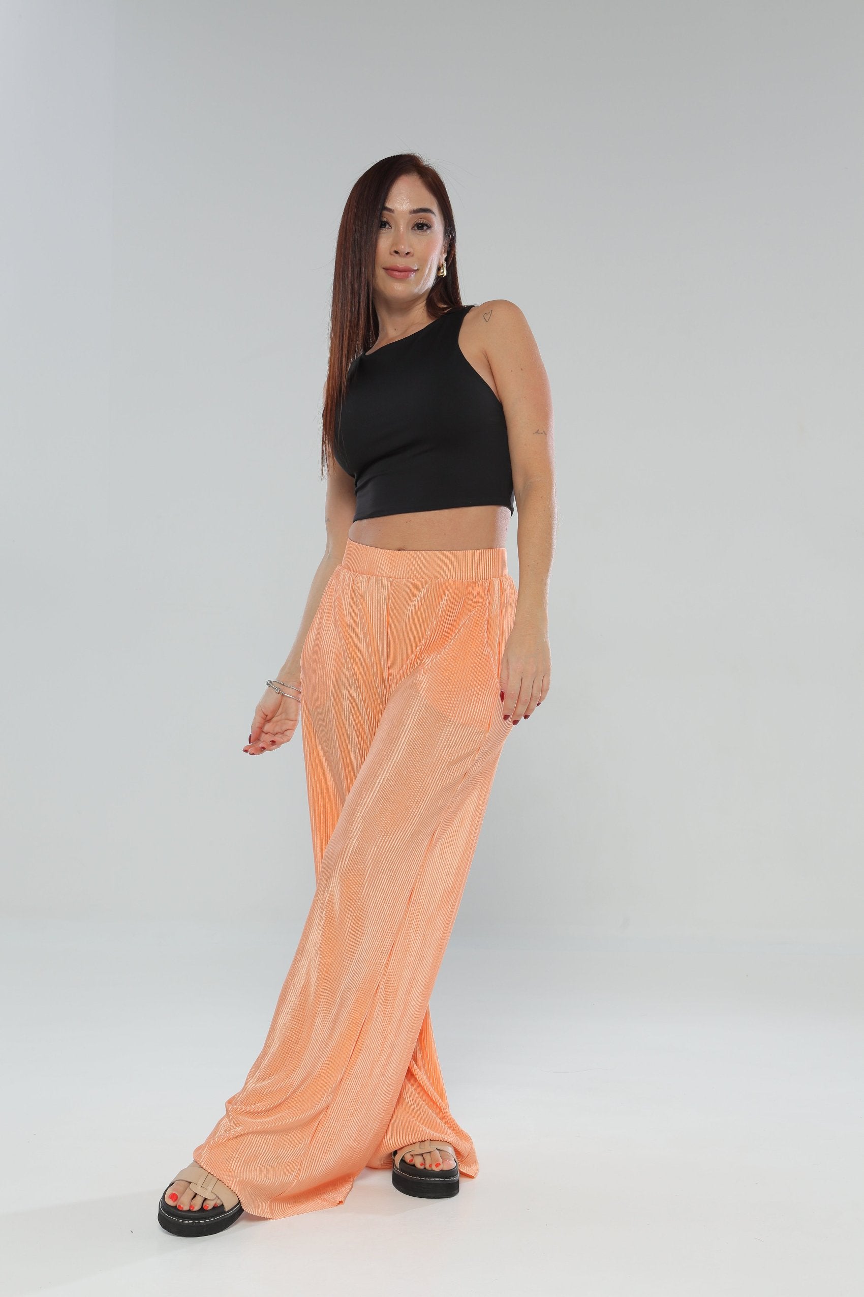 Pantalón plisado silueta amplia