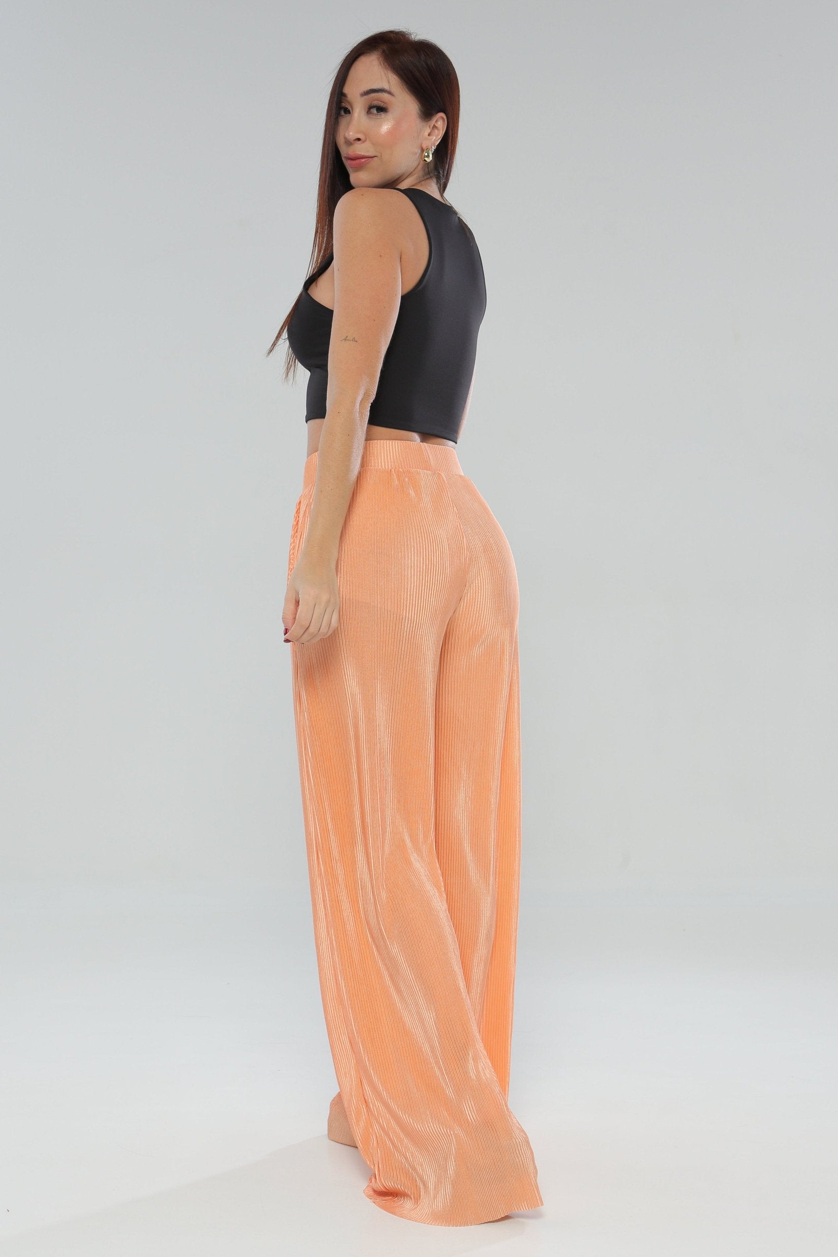 Pantalón plisado silueta amplia