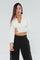 Blusa corta, manga larga con cuello