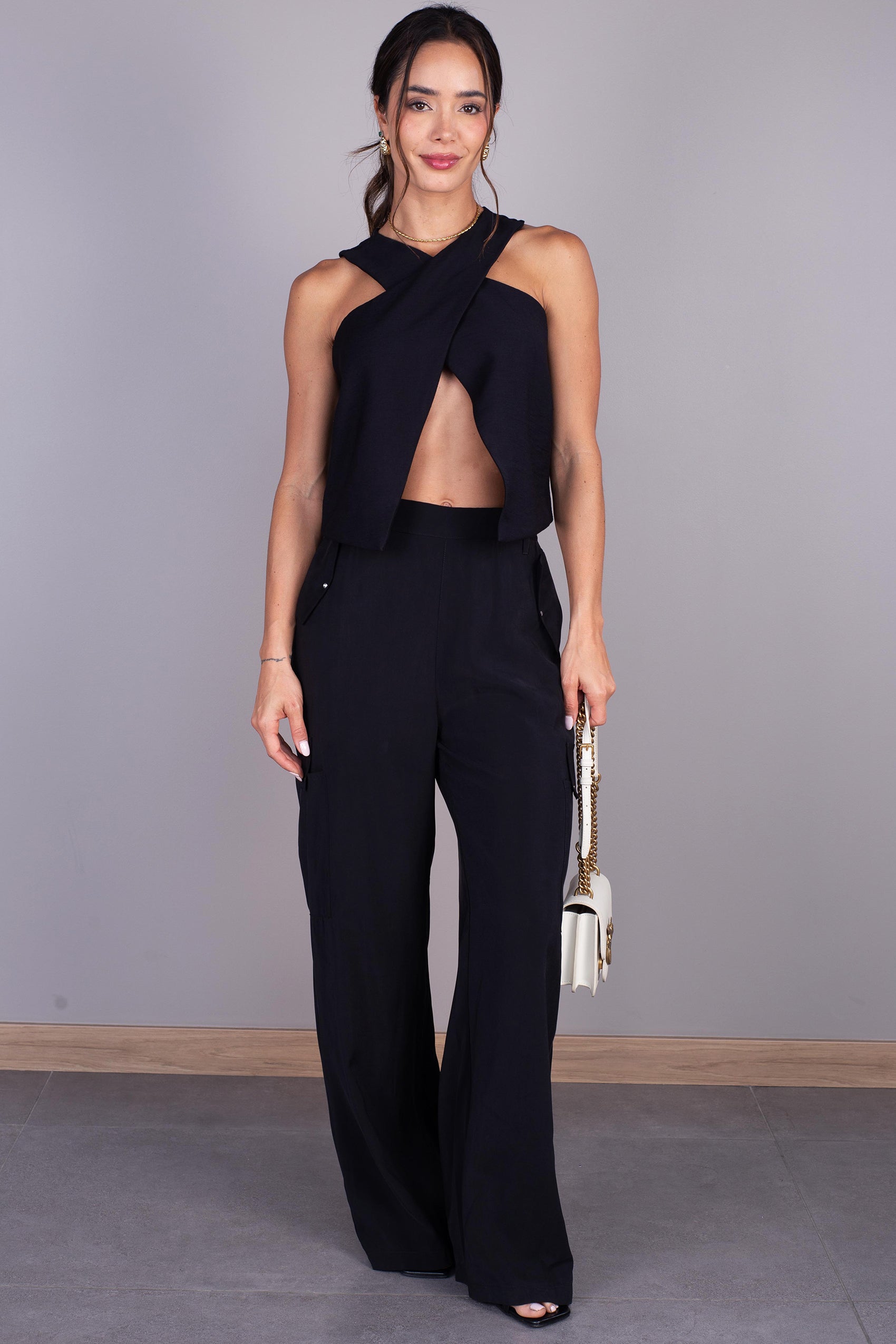 PANTALÓN SILUETA FLARE CON BOLSILLO