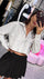 Camisa silueta oversize corta, en tela de rayas.