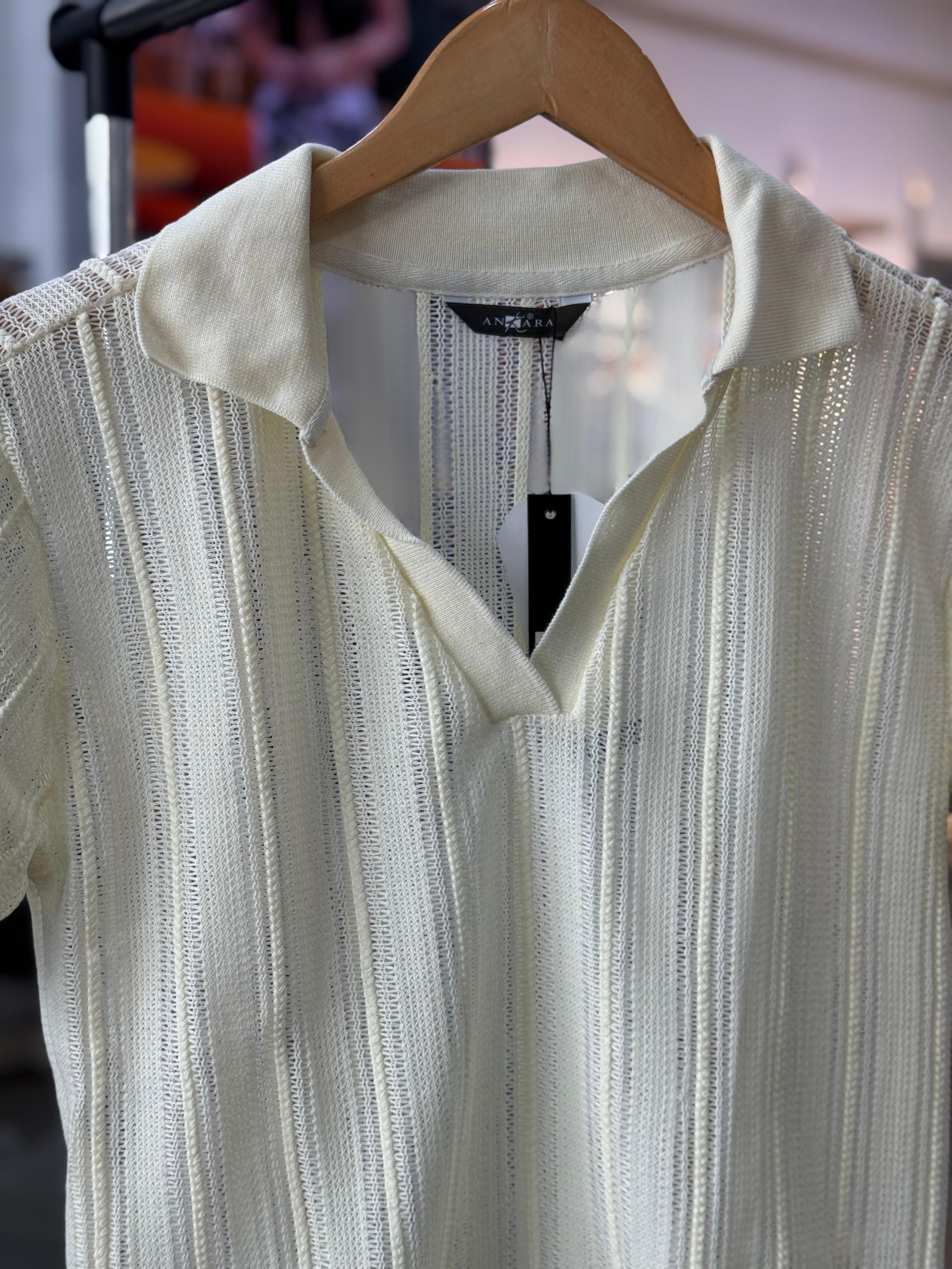 BLUSA MANGA CORTA EN TELA TIPO TEJIDA